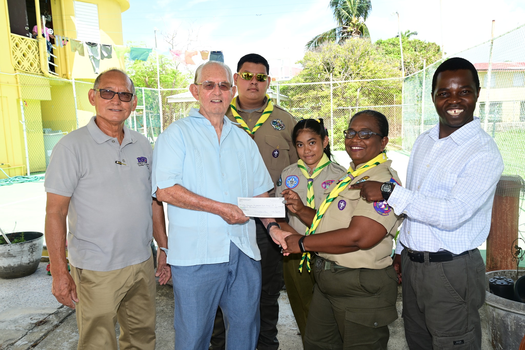6th Corozal Methodist Scout Group receives a small grant and guitar ...